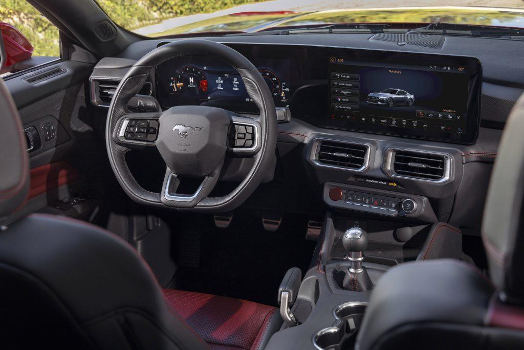 The interior of the new Mustang is the most technologically advanced, driver-centric cockpit of any Mustang to date. The fighter jet-inspired cockpit offers the driver two flowing and curved displays that can be quickly customized to show information the driver wants or needs to see. Pre-production vehicles shown