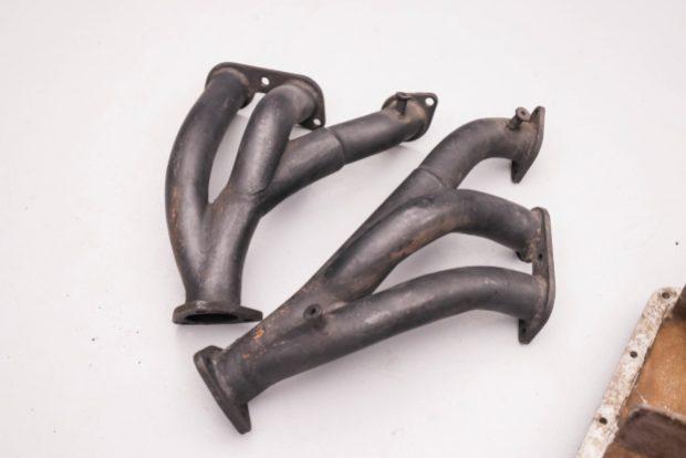 No Reserve: Ferrari 330 Oil Pan & Exhaust Manifolds